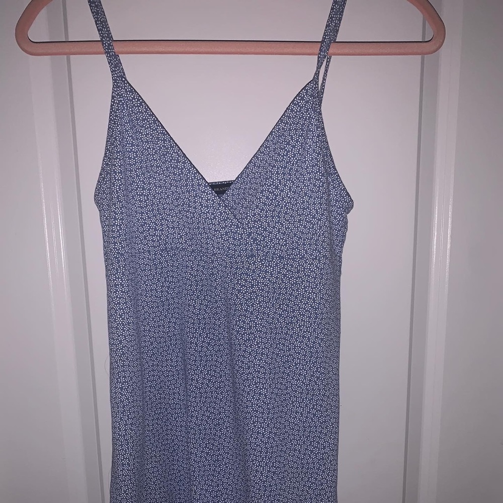 I bought this dress I have never worn it it’s in great condition